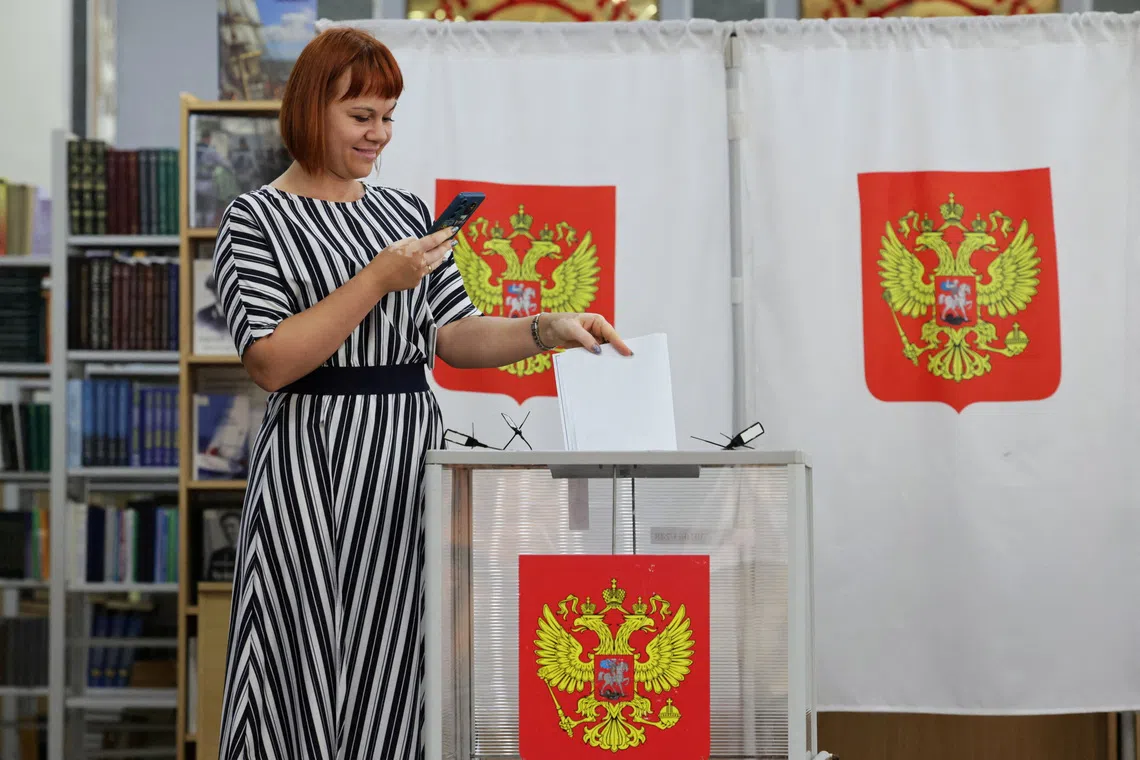 Voting begins in Russian parliamentary election which Putin has cast as barometer of support for war