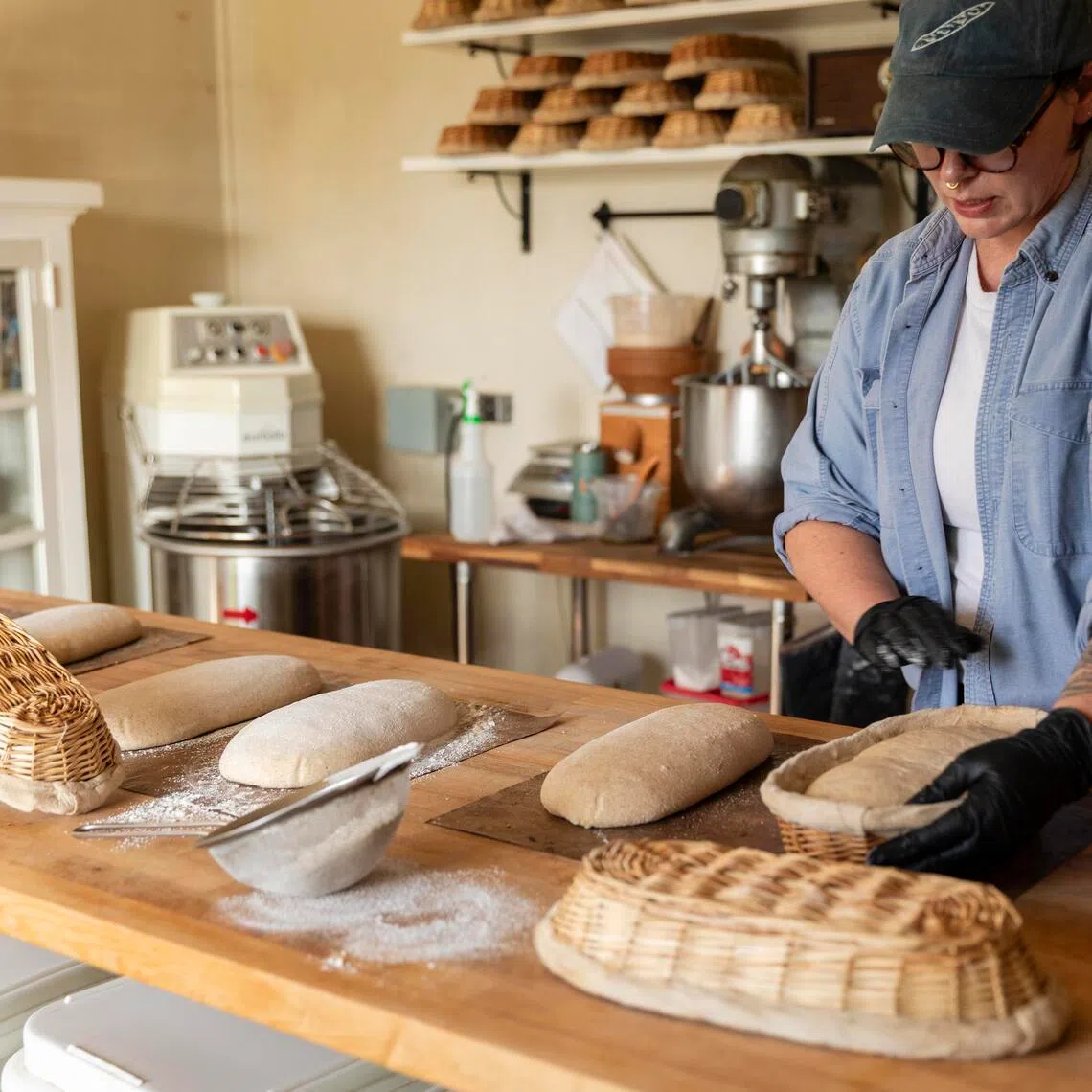 Bonnie Ohara makes sourdough bread in Modesto, Calif., Jan. 22, 2026. Ohara was one of the first people to obtain a cottage baking permit from the state of California. (Ashley Lima/The New York Times)
