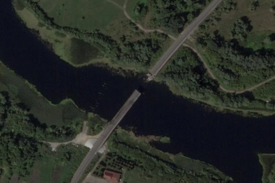 A satellite image shows a bridge collapsed over the Seym river in the Glushkovo district, following a Ukrainian strike in the Kursk region.