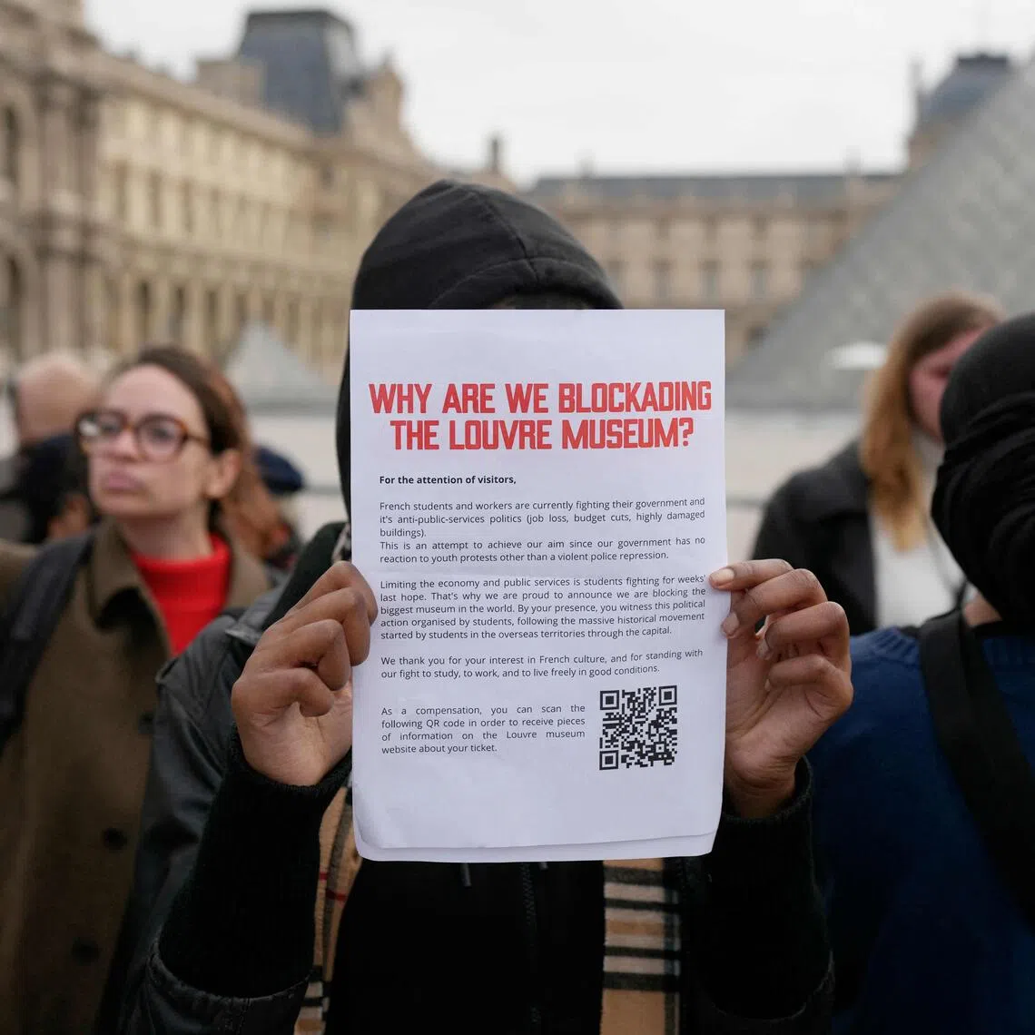 Students from the Ecole du Louvre block the entrance to Paris’ iconic Louvre Museum, the most visited in the world.
