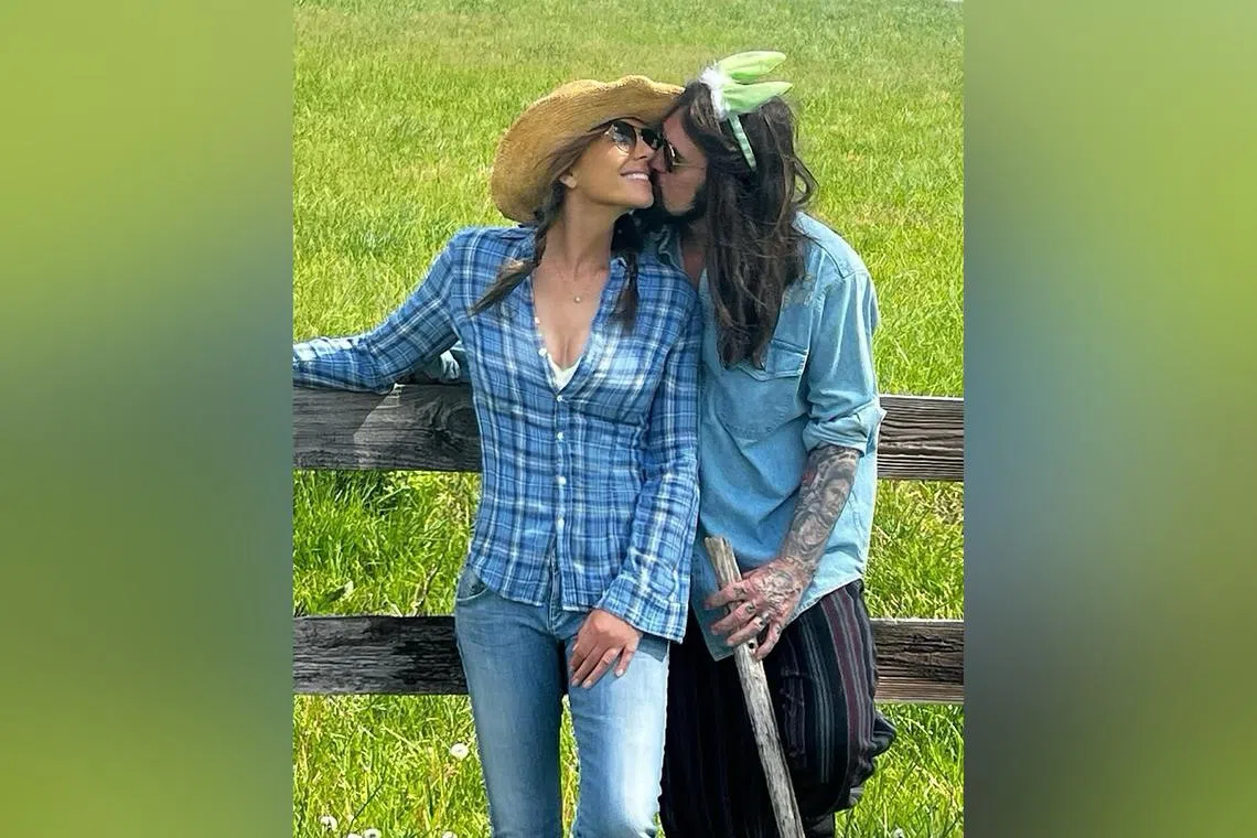 Actress Elizabeth Hurley with singer Billy Ray Cyrus in a photo on social media on April 20.