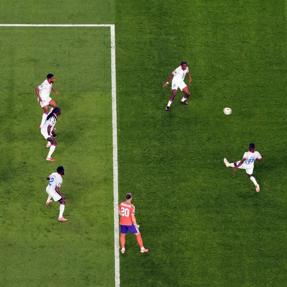 Soccer Football - FIFA World Cup 2026 - Group C - Haiti v Scotland - Boston Stadium, Foxborough, Massachusetts, U.S. - June 13, 2026 Scotland's John McGinn scores their first goal past Haiti's Johny Placide REUTERS/Brian Snyder