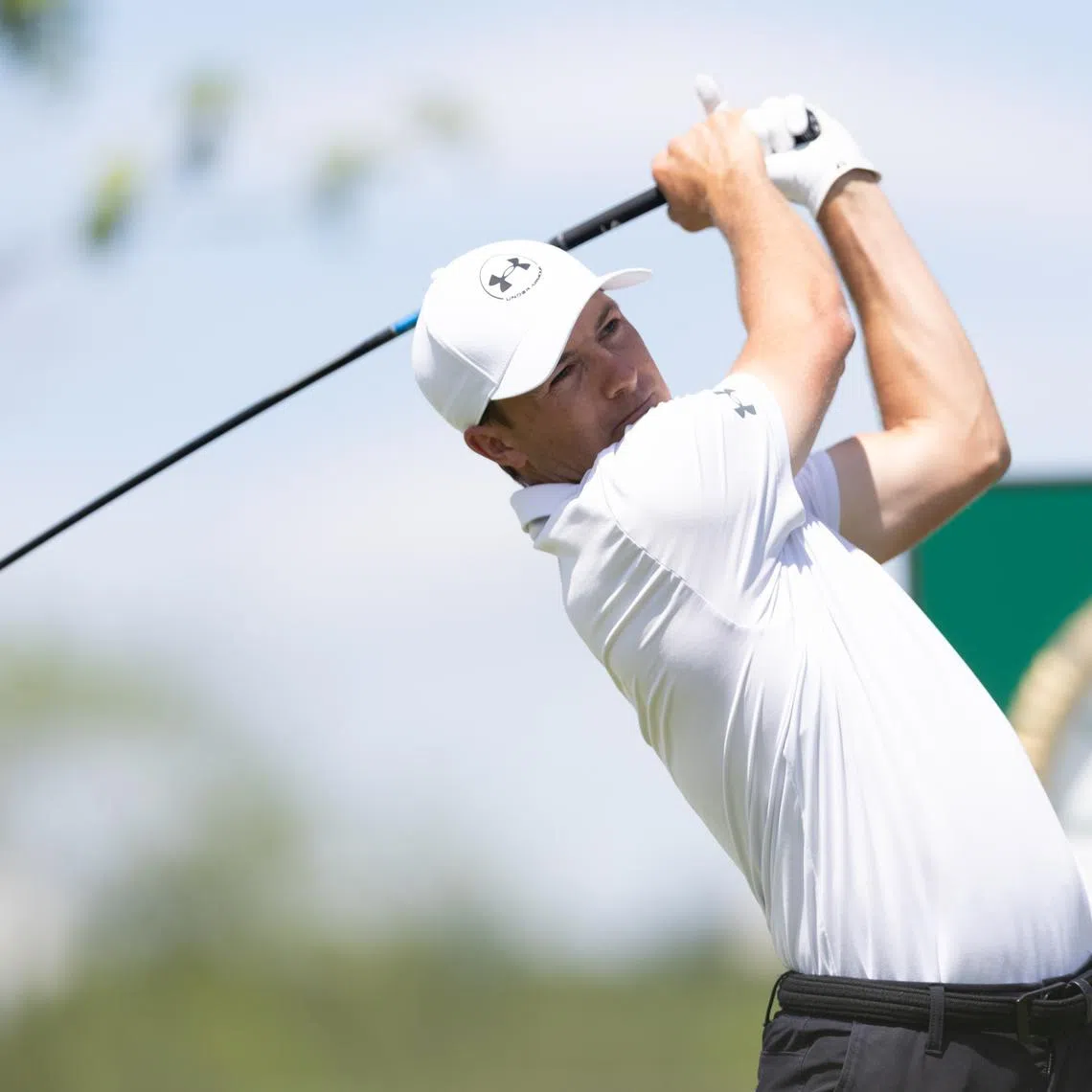 May 8, 2025; Philadelphia, Pennsylvania, USA; Jordan Spieth plays his shot from the first tee during the first round of the Truist Championship golf tournament. Mandatory Credit: Bill Streicher-Imagn Images
