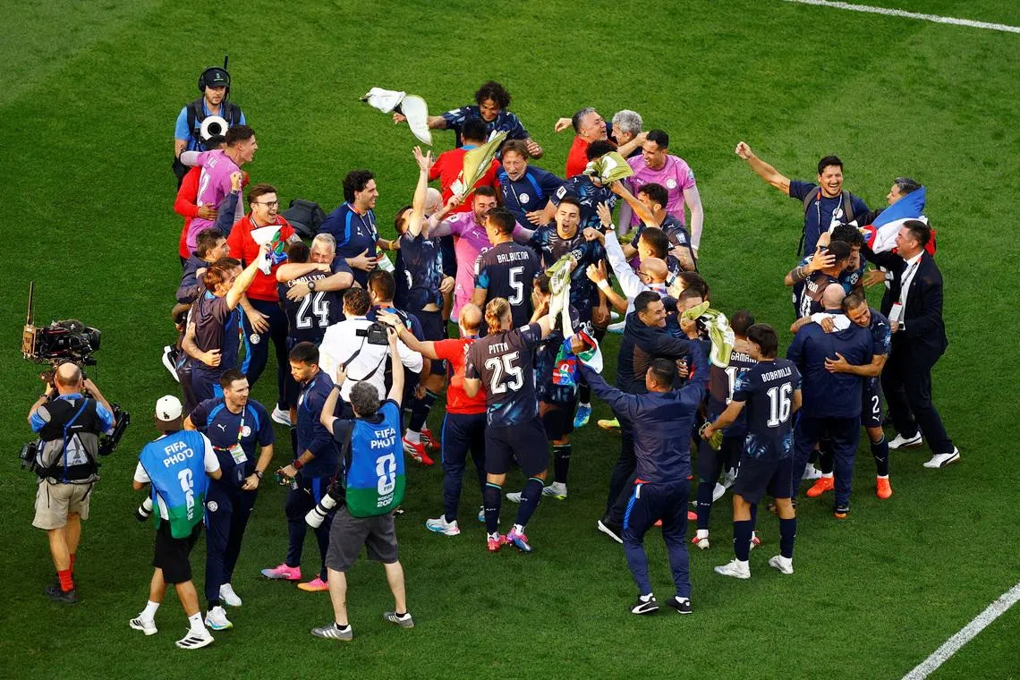 Soccer Football - FIFA World Cup 2026 - Round of 32 - Germany v Paraguay - Boston Stadium, Foxborough, Massachusetts, U.S. - June 29, 2026 Paraguay players and staff celebrate after the match as Paraguay qualify for the Round of 16 stage of the World Cup REUTERS/Pilar Olivares