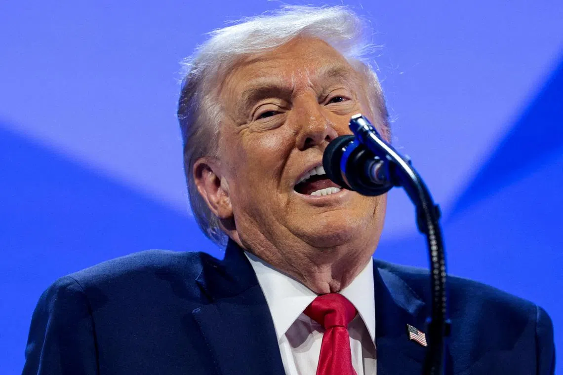 FILE PHOTO: U.S. President Donald Trump speaks during the 56th annual World Economic Forum, in Davos, Switzerland, January 21, 2026. REUTERS/Jonathan Ernst/File Photo