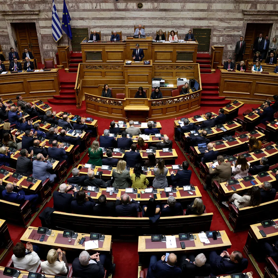 Greek Prime Minister Kyriakos Mitsotakis speaks at the Greek parliament as parliament votes on the 2026 budget, in Athens, Greece, December 16, 2025. REUTERS/Louiza Vradi