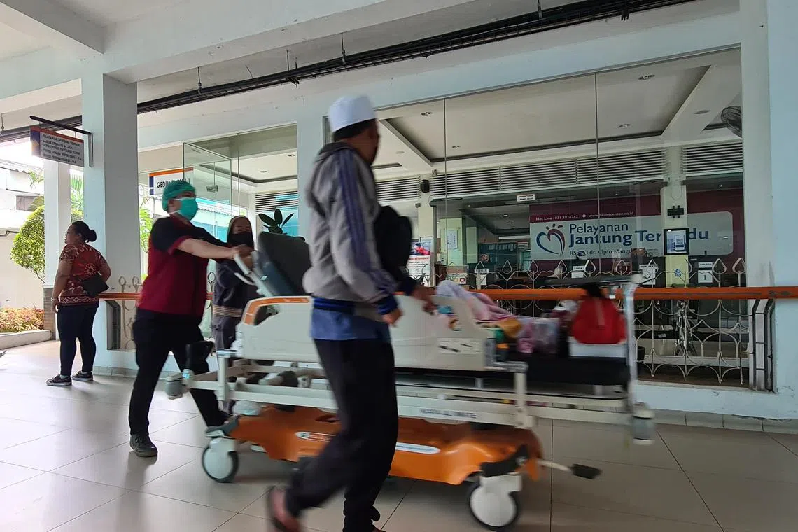 lydoctor - A health worker moving a patient from a ward at Cipto Mangunkusumo Hospital in Central Jakarta.



CREDIT: THE STRAITS TIMES/LINDA YULISMAN