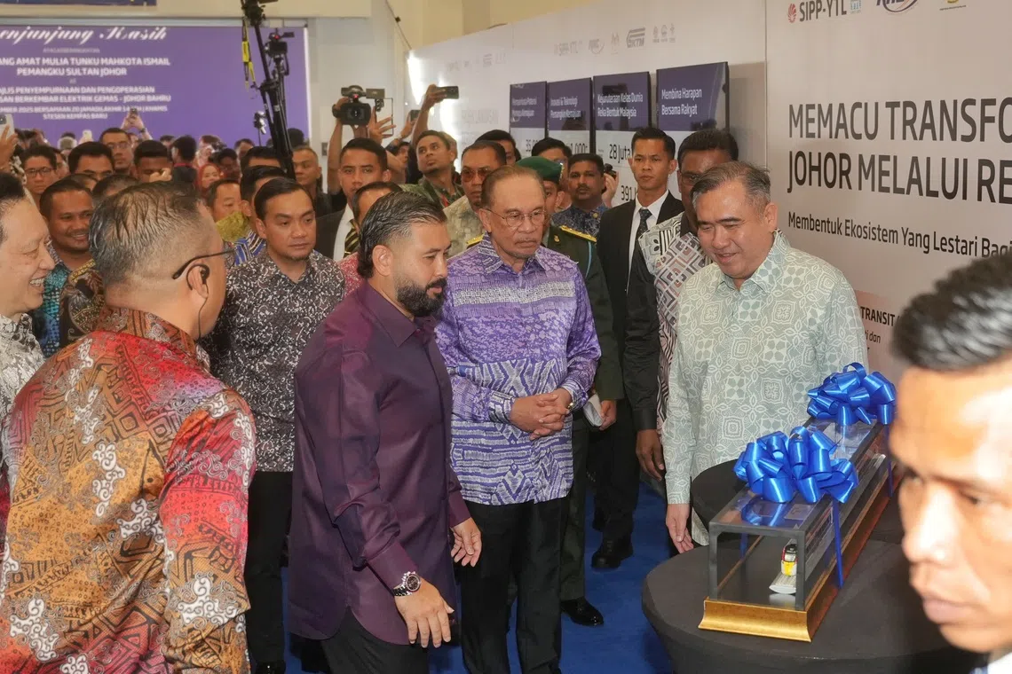 (From second from left) Regent of Johor, Tunku Ismail Sultan Ibrahim, Malaysian PM Anwar Ibrahim and Malaysian Transport Minister Anthony Loke at the ETS completion and operationalisation ceremony on Dec 11.