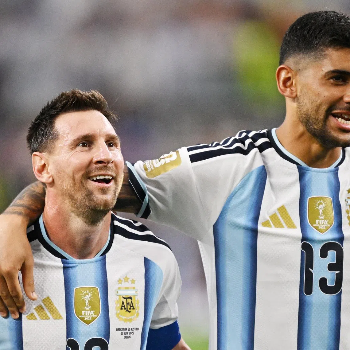 Soccer Football - FIFA World Cup 2026 - Group J - Argentina v Austria - Dallas Stadium, Arlington, Texas, U.S. - June 22, 2026 Argentina's Lionel Messi and Cristian Romero celebrate after the match IMAGN IMAGES via Reuters/Jerome Miron