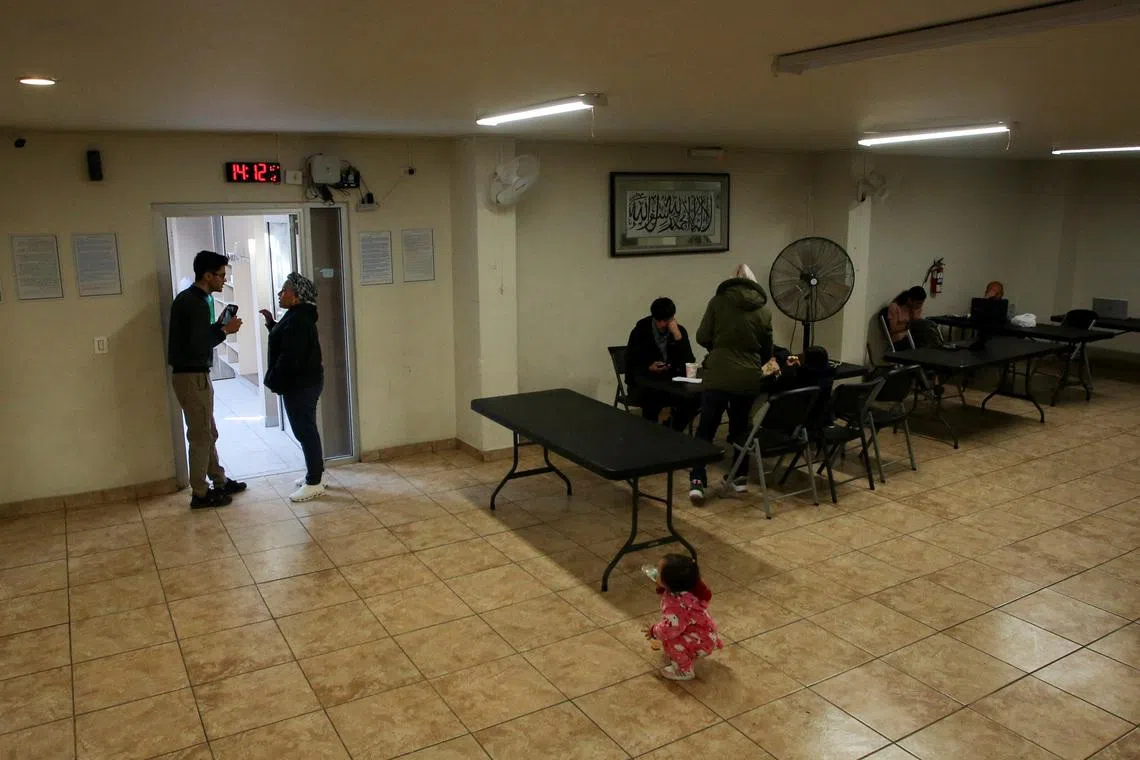 FILE PHOTO: Muslim migrants stranded after U.S. President Donald Trump cancelled all U.S. asylum appointments for migrants waiting in Mexico are seen at the Assabil shelter, the only such refuge in Mexico specifically for Muslim migrants, in Tijuana, Mexico January 21, 2025. REUTERS/Jorge Duenes/File Photo