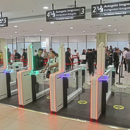 Malaysians using the newly installed NIISe autogates at Penang International Airport.