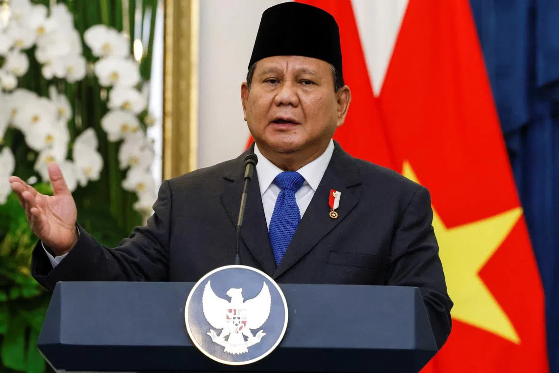 Indonesian President Prabowo Subianto speaks during a press conference with Vietnam's Communist Party General Secretary To Lam (not pictured), at the Merdeka Palace in Jakarta, Indonesia, March 10, 2025. REUTERS/Ajeng Dinar Ulfiana
