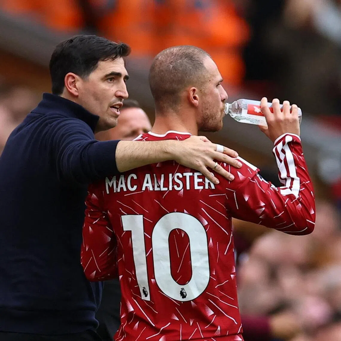 Liverpool manager Andoni Iraola with substitute Alexis Mac Allister during their 0-0 EPL draw with Fulham on Sept 12.