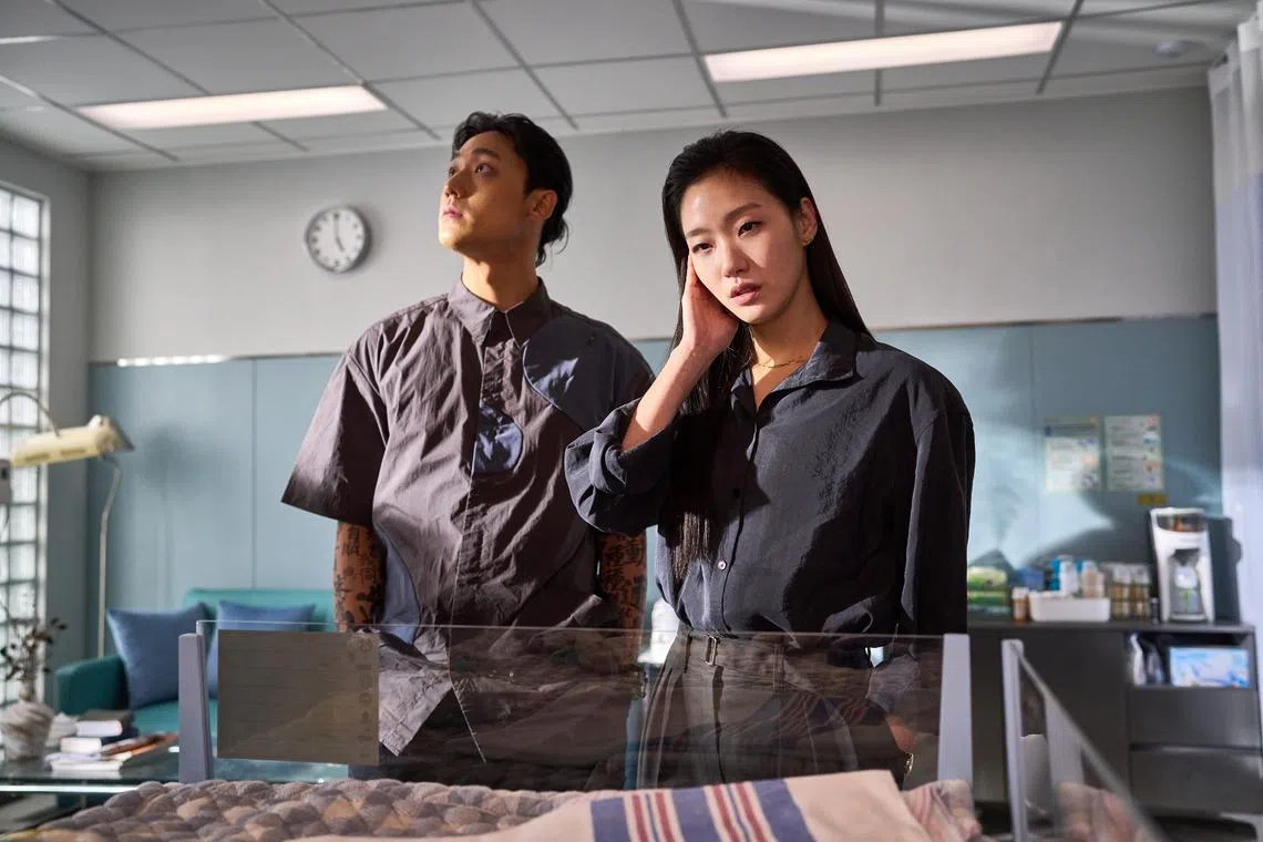 Lee Do-hyun (left) and Kim Go-eun are a shaman duo in horror K-movie Exhuma.                  