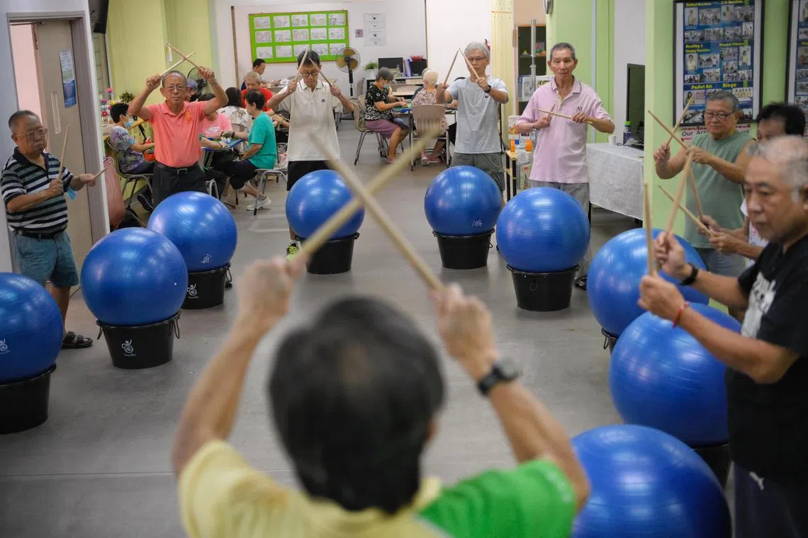 Trans Focus AAC in Bukit Timah sets aside one of its four weekly drumming fitness sessions for male seniors.