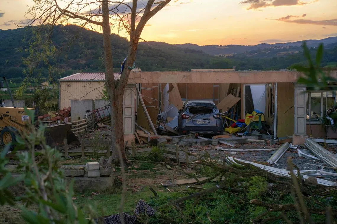 Damaged houses after a tornado struck Pomas in south-western France, on Aug 24.