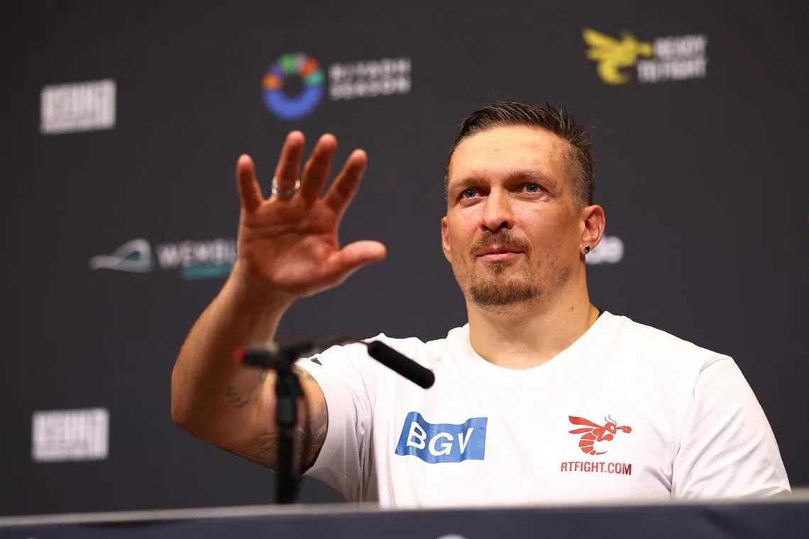 Boxing - Oleksandr Usyk v Daniel Dubois - Undisputed World Heavyweight Title - BoxPark Wembley, London, Britain - July 19, 2025 Oleksandr Usyk during the press conference after winning the fight against Daniel Dubois Action Images via Reuters/Andrew Boyers