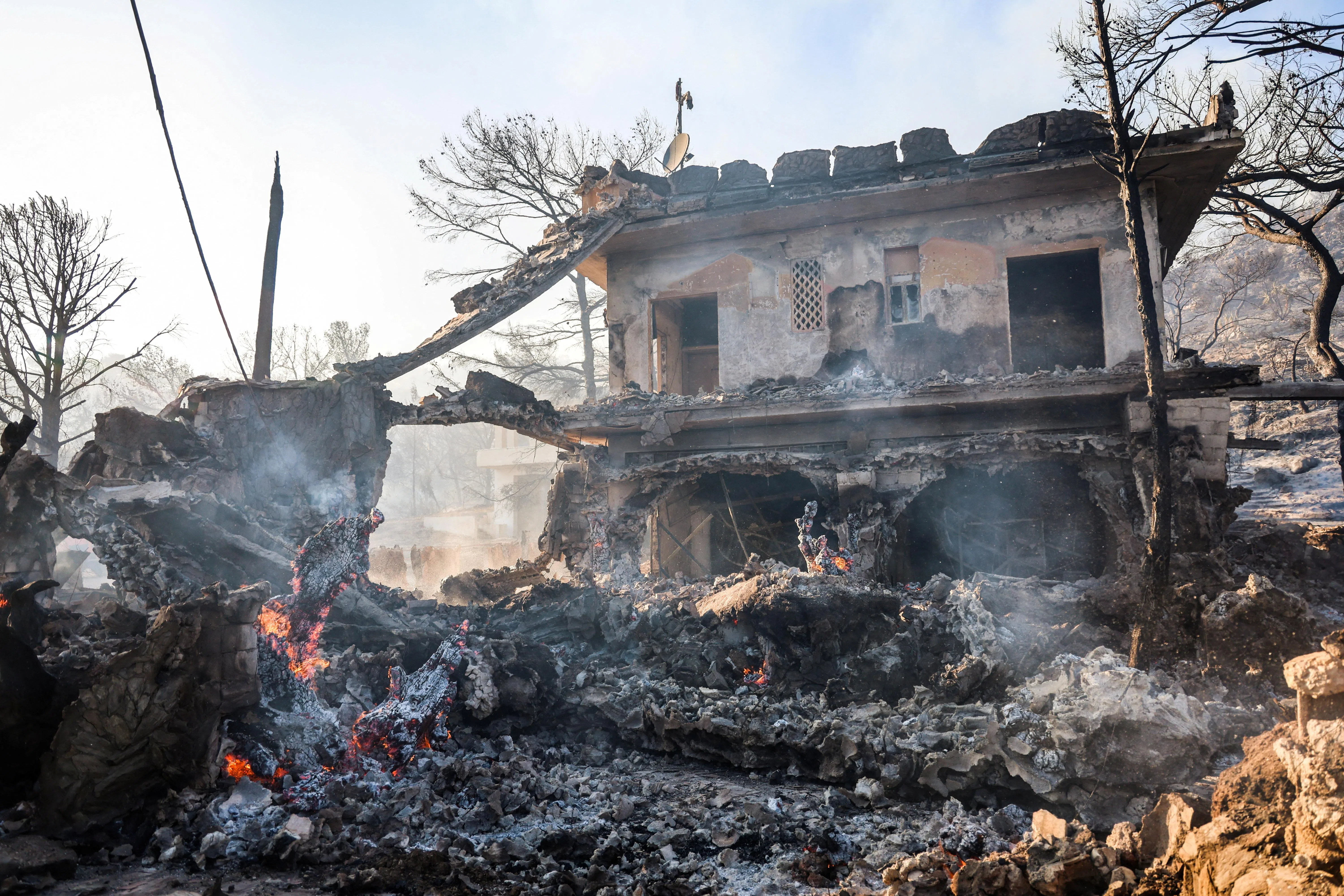 A house destroyed by fire on the Greek island of Salamina, west of Athens, on Aug 16.