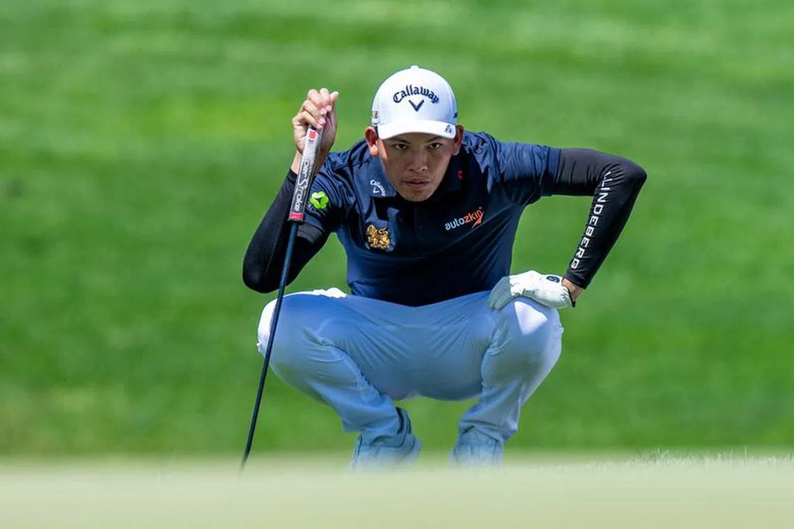 Jul 30, 2022; Bedminster, New Jersey, USA; Phachara Khongwatmai lines up a putt on the 4th green during the second round of a LIV Golf tournament at Trump National Golf Club Bedminster. / John Jones-USA TODAY Sports/File Photo
