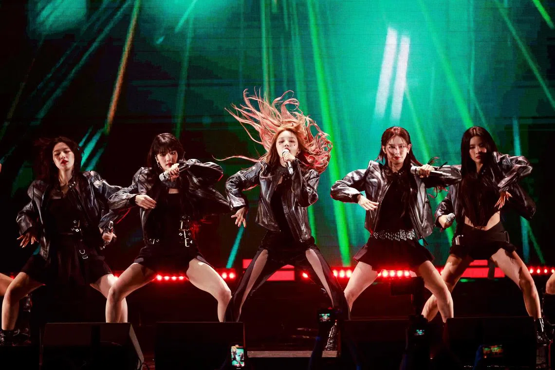 (L-R) Shuhua, Miyeon, Soyeon, Minnie, and Yuqi, members of South Korean girl group (G)I-DLE, perform onstage during the 2023 iHeartRadio Jingle Ball at the KIA Forum in Inglewood, California, on Dec 1, 2023. 