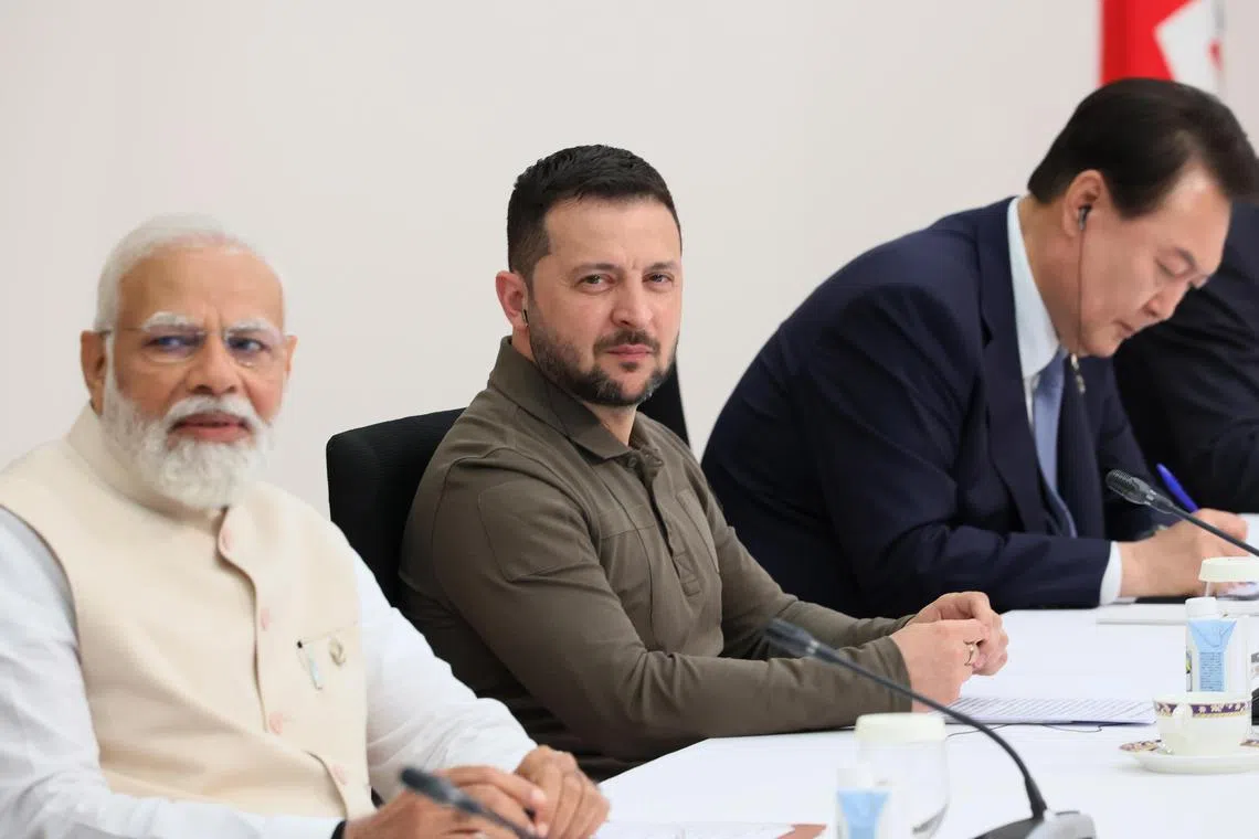 (From left) Indian Prime Minister Narendra Modi, Ukraine's President Volodymyr Zelensky and South Korea's President Yoon Suk-yeol attending a session at the G-7 Hiroshima Summit on Sunday.