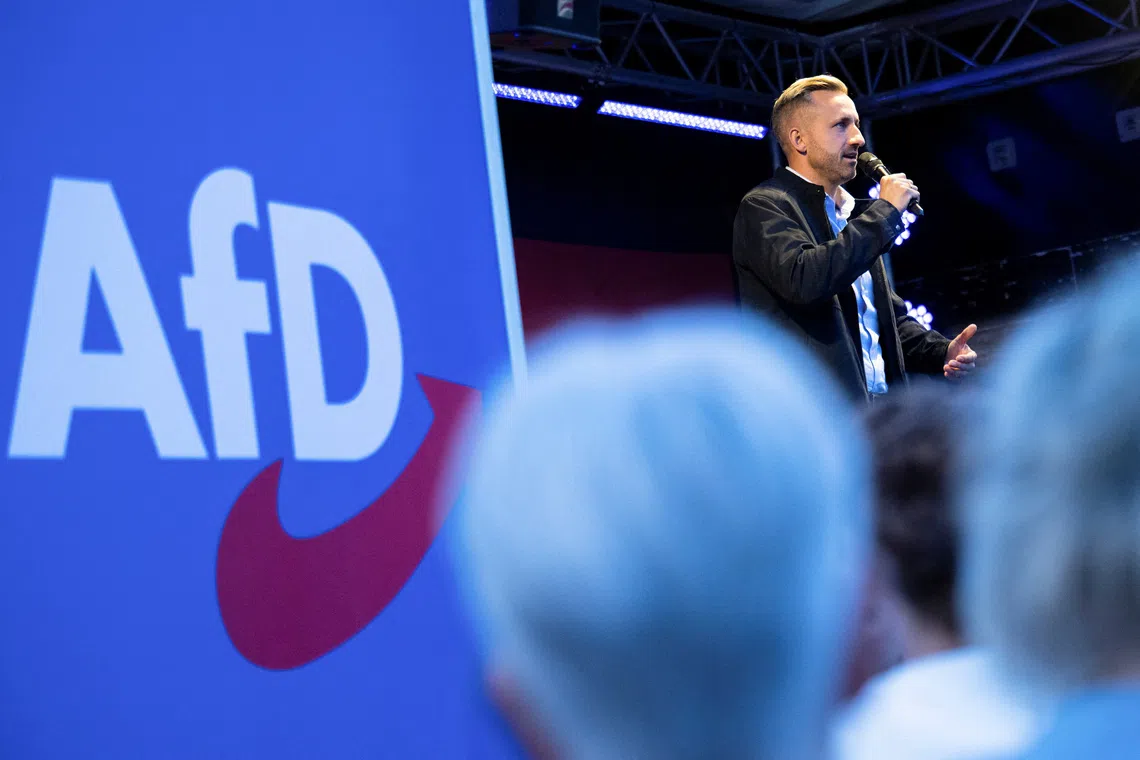 Ulrich Siegmund, top candidate of the far-right Alternative for Germany (AfD) party, speaks on stage during a campaign rally ahead of Germany's Saxony-Anhalt state election, in Naumburg, Germany August 24, 2026. REUTERS/Annegret Hilse