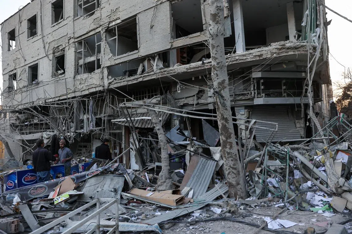 Debris lies on a street in the aftermath of an Israeli and the U.S. strike on a police station, amid the U.S.-Israel conflict with Iran, in Tehran, Iran, March 2, 2026. Majid Asgaripour/WANA (West Asia News Agency) via REUTERS
