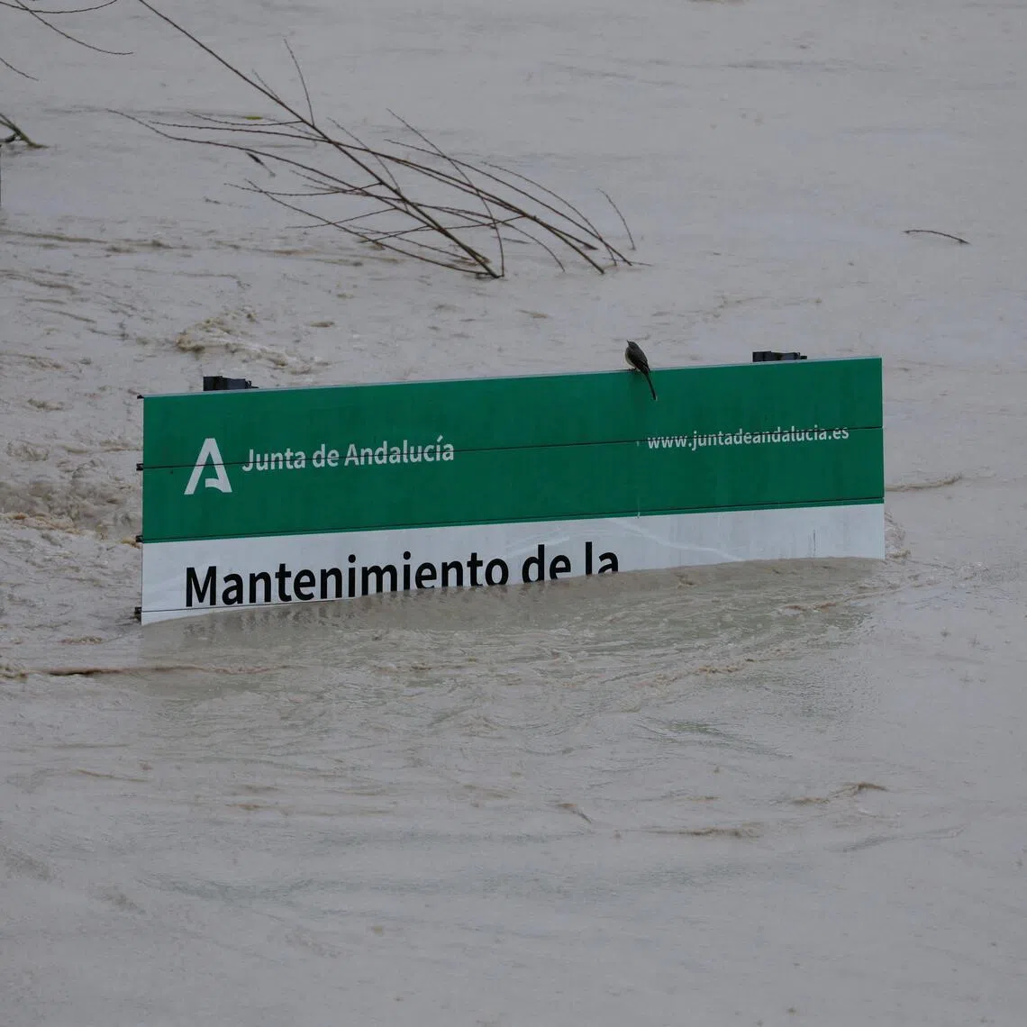 A government sign in Cordoba, Spain, on Feb 7, shows the depth of the flooding from Storm Marta in parts of the  Iberian Peninsula.