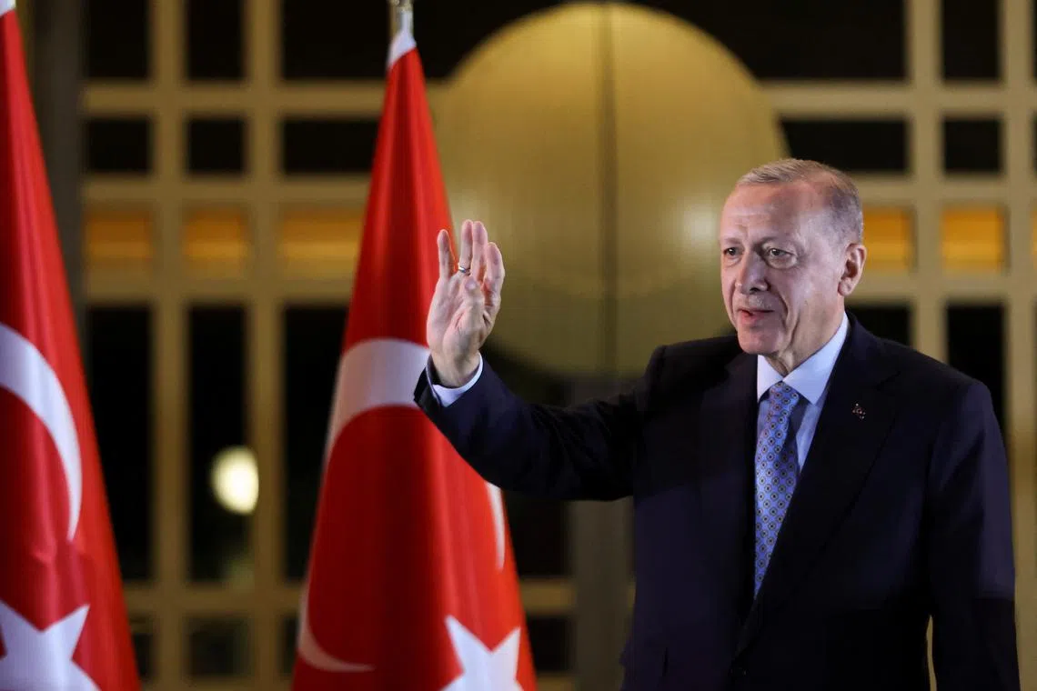 Turkish President Tayyip Erdogan addresses his supporters following his victory, at the Presidential Palace in Ankara, Turkey, on May 28.