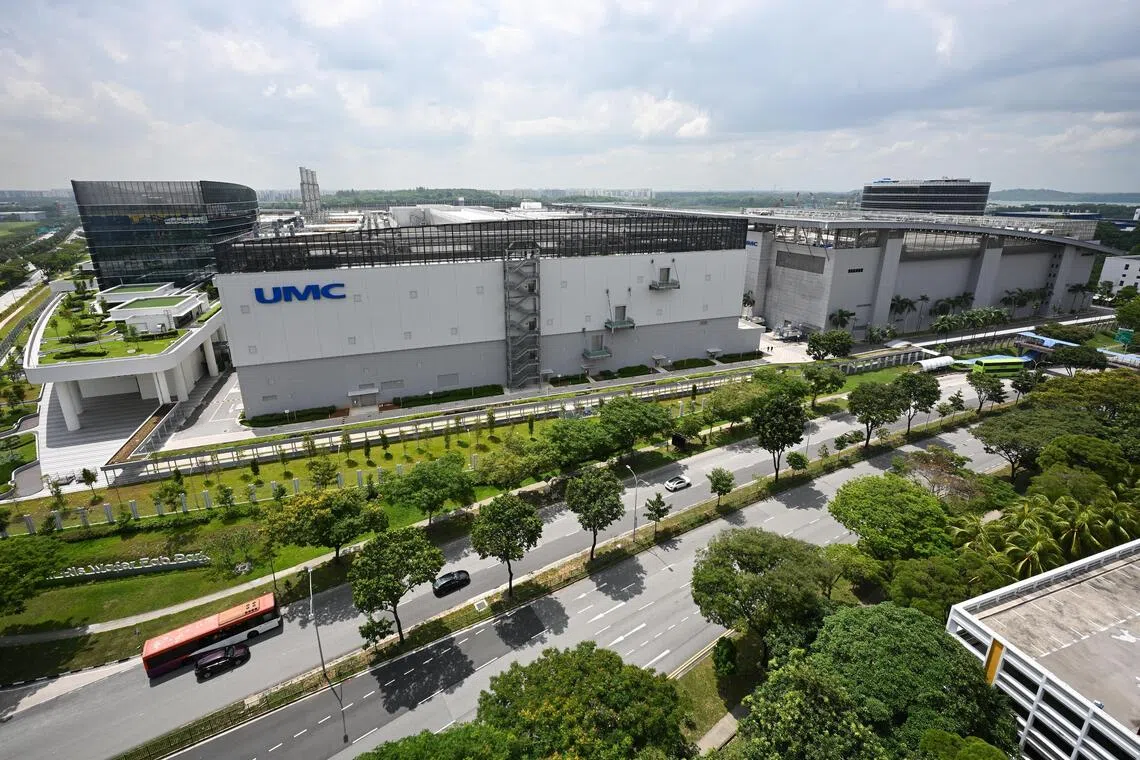 UMC’s new plant (left), which is next to its existing fab facility, will take its annual production of integrated circuit wafers to 1.3 million in the next few years.