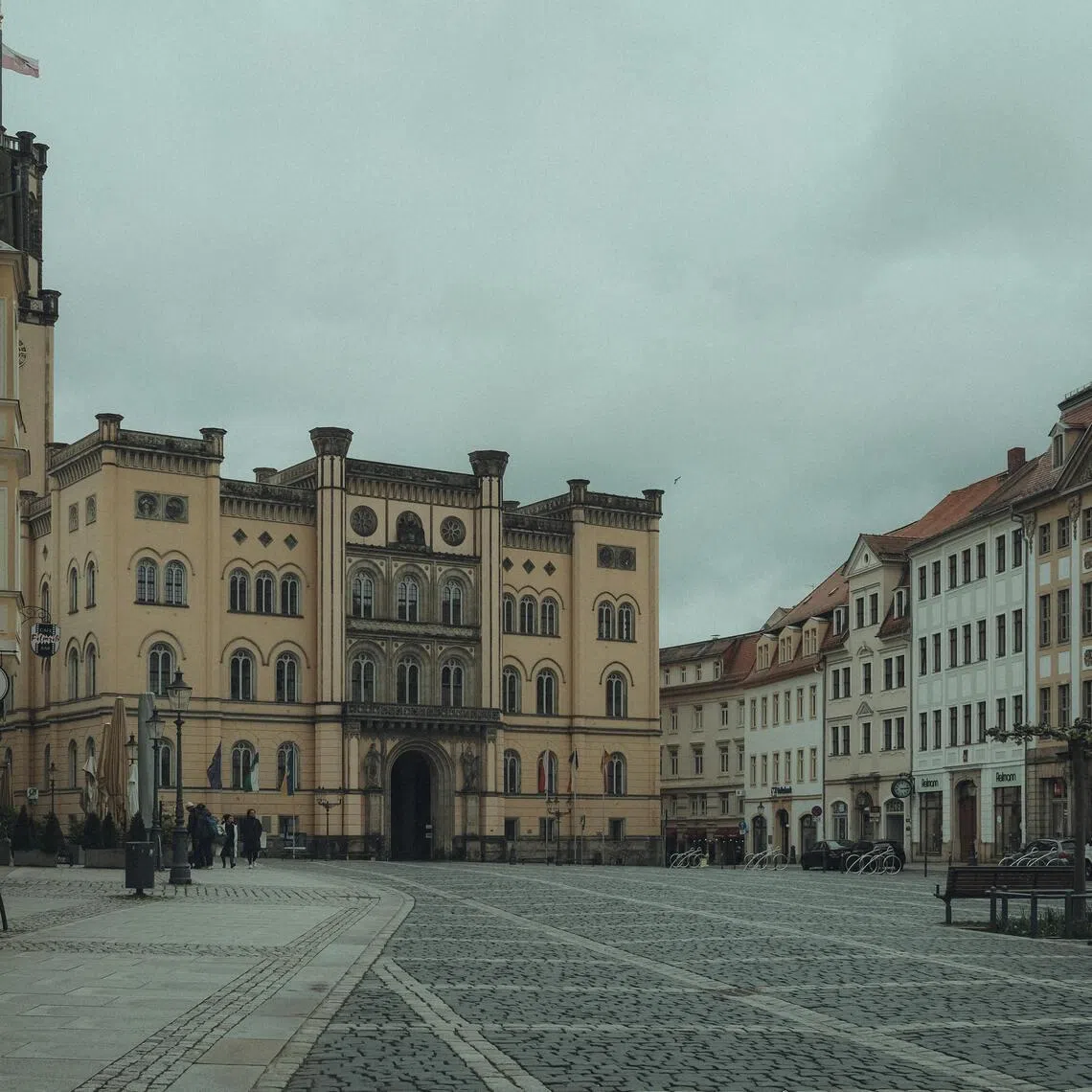Two women, aged 25 and 26, and a 46-year-old man are presumed missing after the collapse of a historic apartment building in Goerlitz, a popular location for movie shoots.