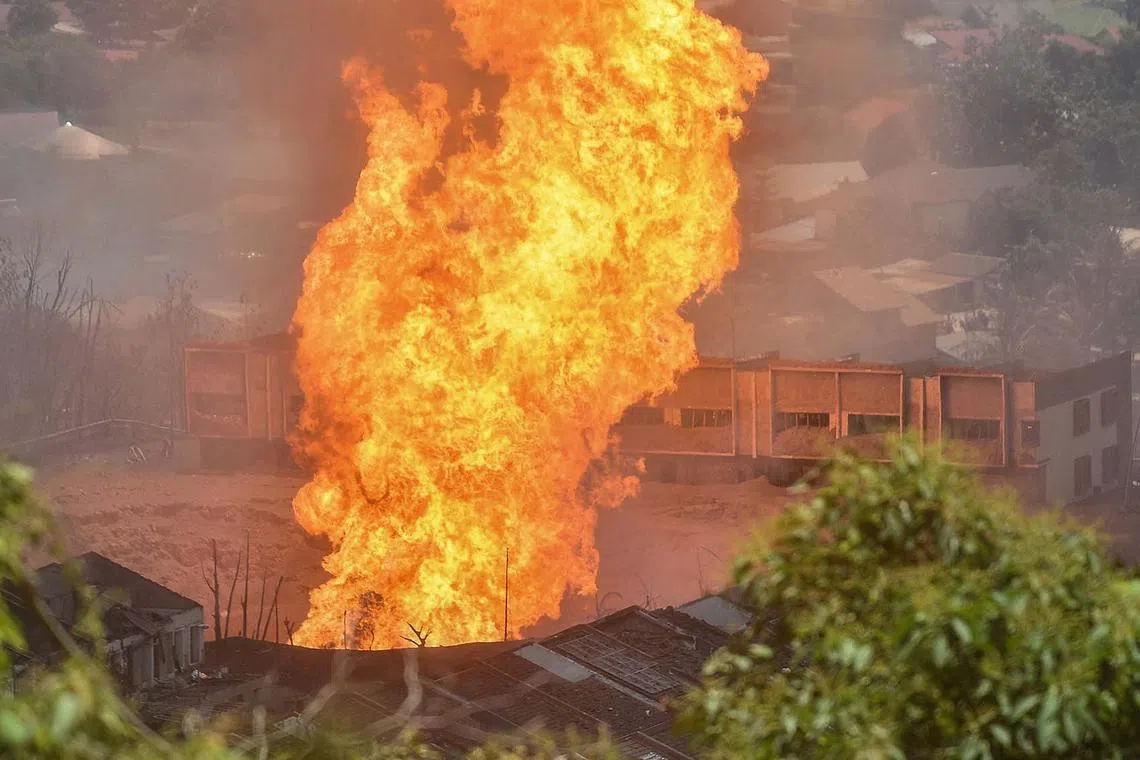 A fire caused by a gas pipeline leak in Puchong, Selangor, on April 1, 2025. A massive fire forced people from their homes during Eid celebrations as it towered over residential districts near the Malaysian capital Kuala Lumpur. 