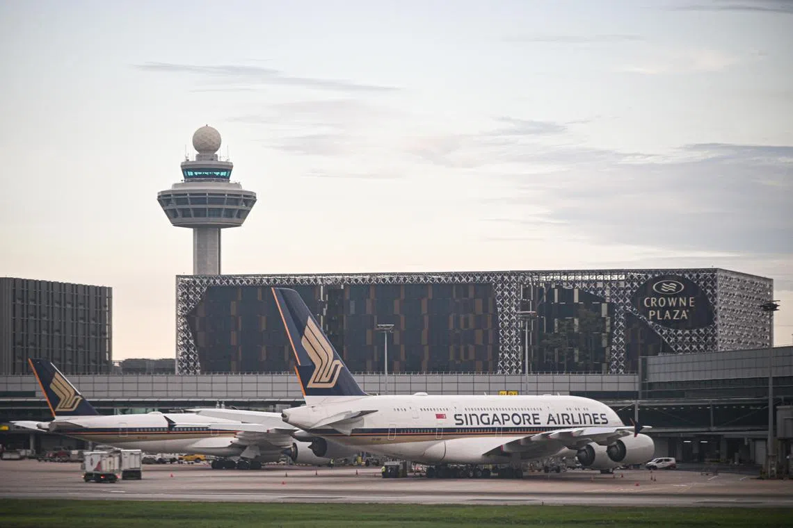 ST20240428-202498208747-Lim Yaohui-pixgeneric/
Generic photograph of Crowne Plaza Changi Airport hotel, Singapore Airlines (SIA) aeroplanes and Changi Airport control tower on April 30, 2024.
Can be used for stories on cabin, carrier, commercial, airline, pilot, plane, oil, pollution, air, aviation, airport, fuel, travel, business and money.
(ST PHOTO: LIM YAOHUI)