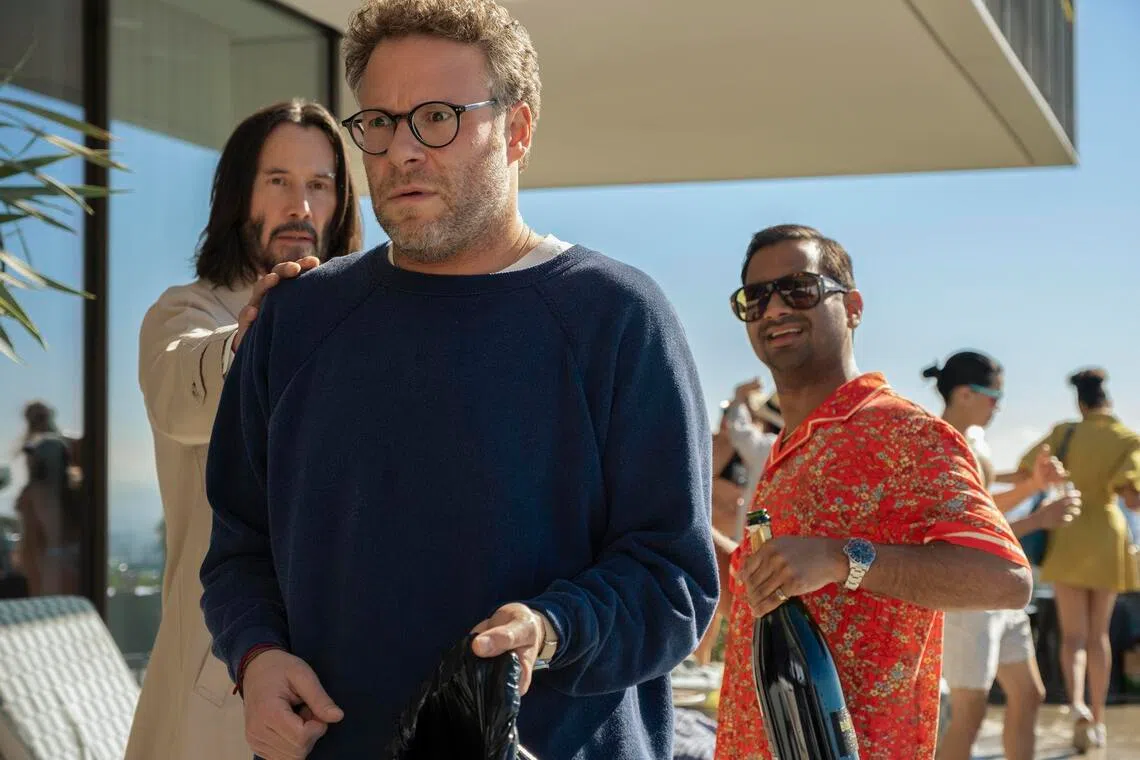 (From left) Keanu Reeves, Seth Rogen and Aziz Ansari in Good Fortune.