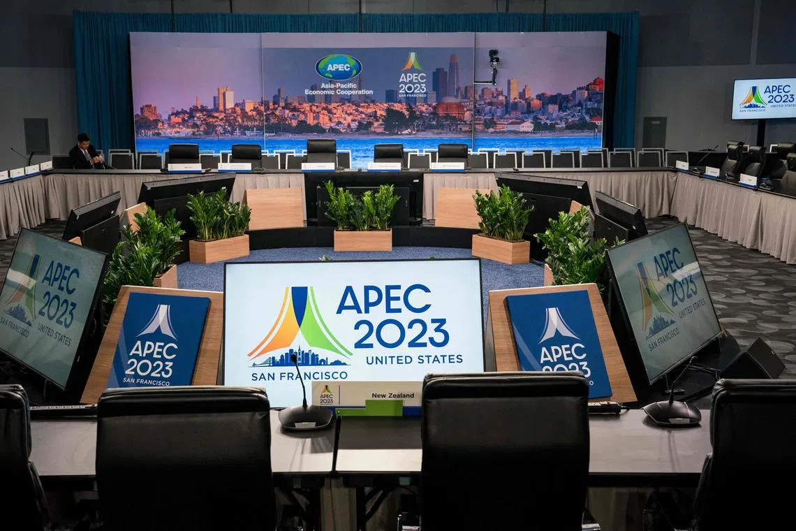 SAN FRANCISCO, CALIFORNIA - NOVEMBER 11: Screens display the APEC 2023 logo before the start of the Concluding Senior Officials' Meeting during the Asia-Pacific Economic Cooperation summit at the Moscone Center on November 11, 2023 in San Francisco, California. The 2023 Asia-Pacific Economic Cooperation (APEC) Summit is set to run through November 17, with more than 20,000 people including dozens of world leaders and hundreds of CEOs attending the event.   Kent Nishimura/Getty Images/AFP (Photo by Kent Nishimura / GETTY IMAGES NORTH AMERICA / Getty Images via AFP)