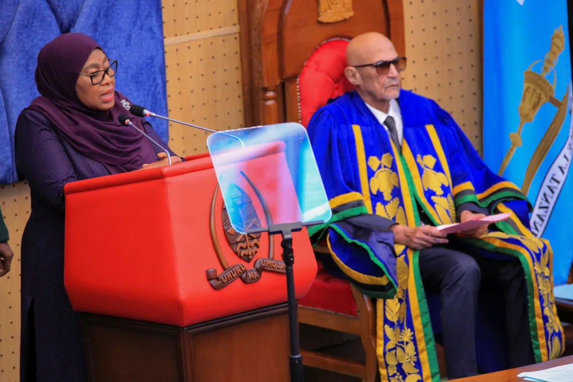 Tanzania's President Samia Suluhu Hassan, flanked by the Tanzania Speaker of Parliament Mussa Azzan Zungu, addresses elected legislators at the Parliament Buildings in Dodoma, Tanzania November 14, 2025. REUTERS/Stringer