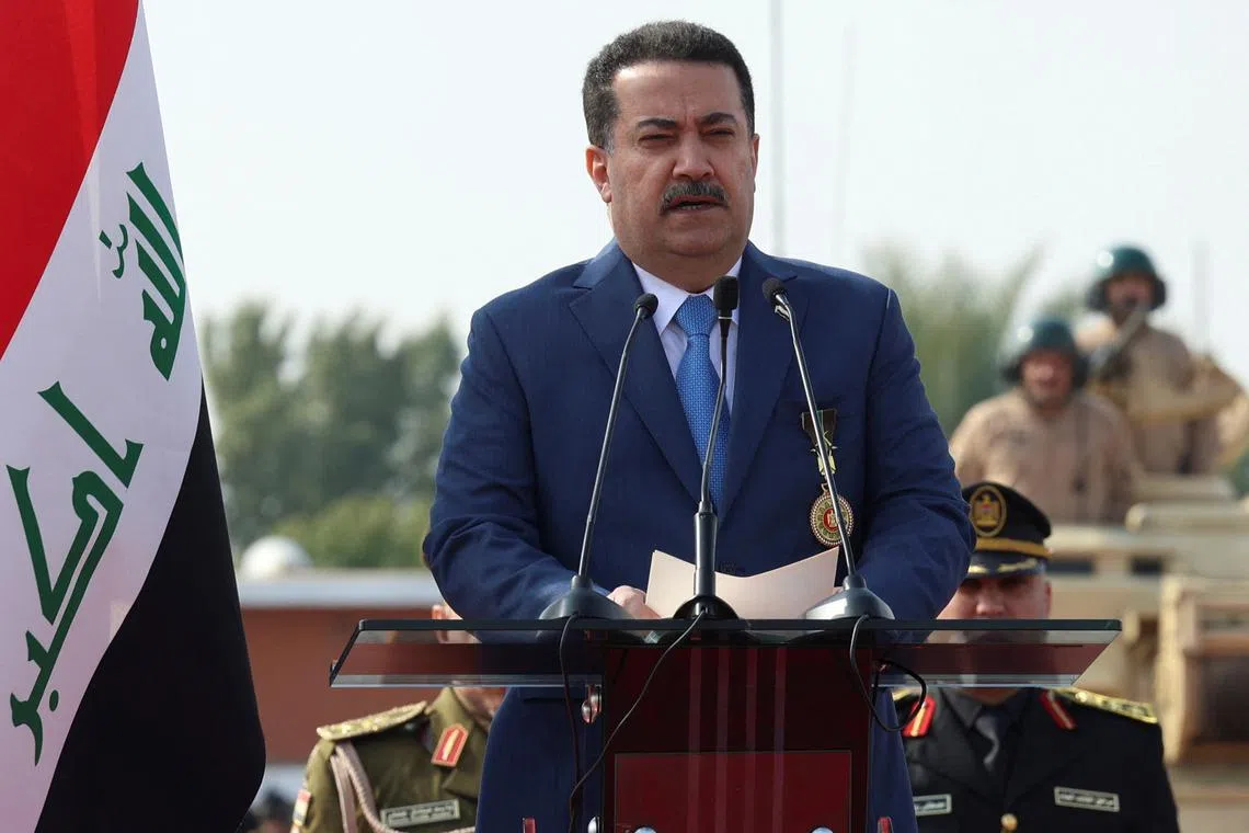 FILE PHOTO: Iraqi Prime Minister Mohammed Shia Al-Sudani speaks during a military parade to celebrate the 104th anniversary of the founding of the Iraqi army, at the Camp Taji military base on the outskirts of Baghdad, Iraq, January 6, 2025. REUTERS/Ahmed Saad/File Photo
