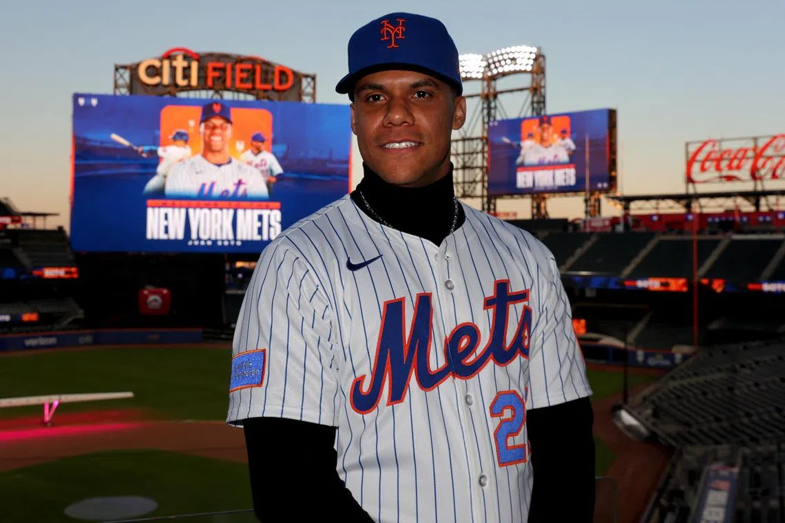 New York Mets right fielder Juan Soto poses for photos during a press conference at Citi Field.