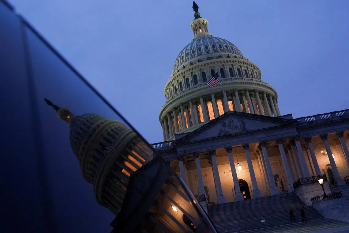 The sun sets behind the U.S. Capitol dome, on the day U.S. President Donald Trump met with top congressional leaders from both parties, just ahead of a September 30 deadline to fund the government and avoid a shutdown, in Washington, D.C., U.S., September 29, 2025. REUTERS/Nathan Howard