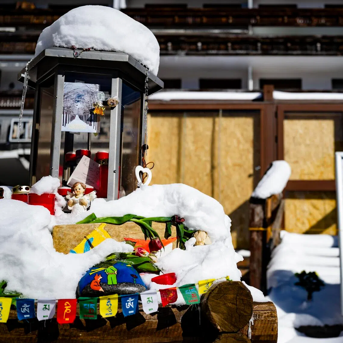 Snow covers the entrance to the 'Le Constellation' bar, three months after the fire tragedy, in Crans-Montana, Switzerland.