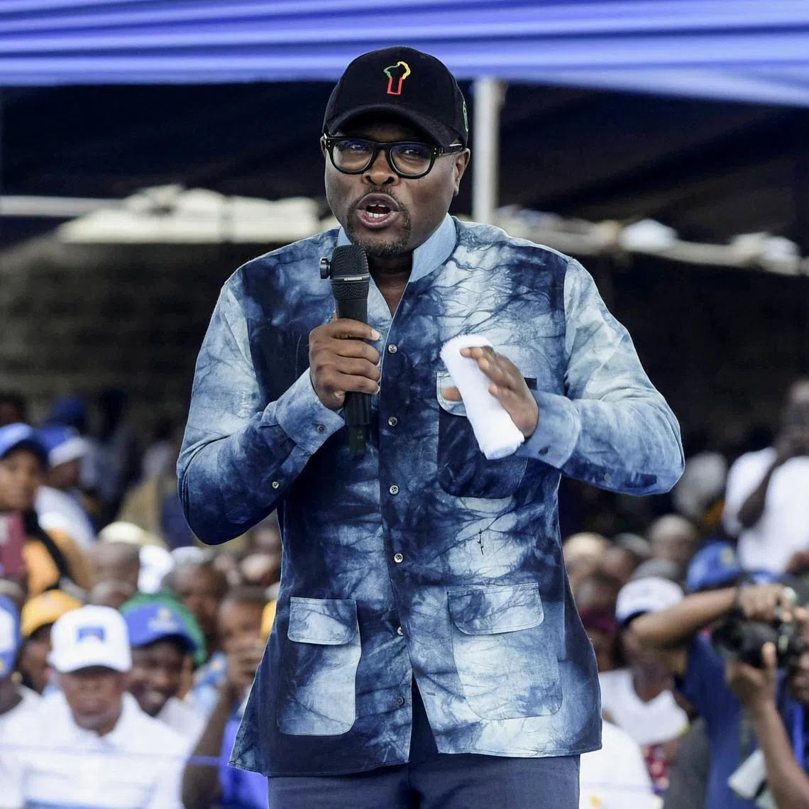 FILE PHOTO: Romuald Wadagni, Benin's finance minister and the ruling party candidate for the presidential election, speaks during a campaign rally ahead of the presidential election scheduled for April 12, in Cotonou, Benin, April 10, 2026.   REUTERS/Charles Placide Tossou/ File Photo
