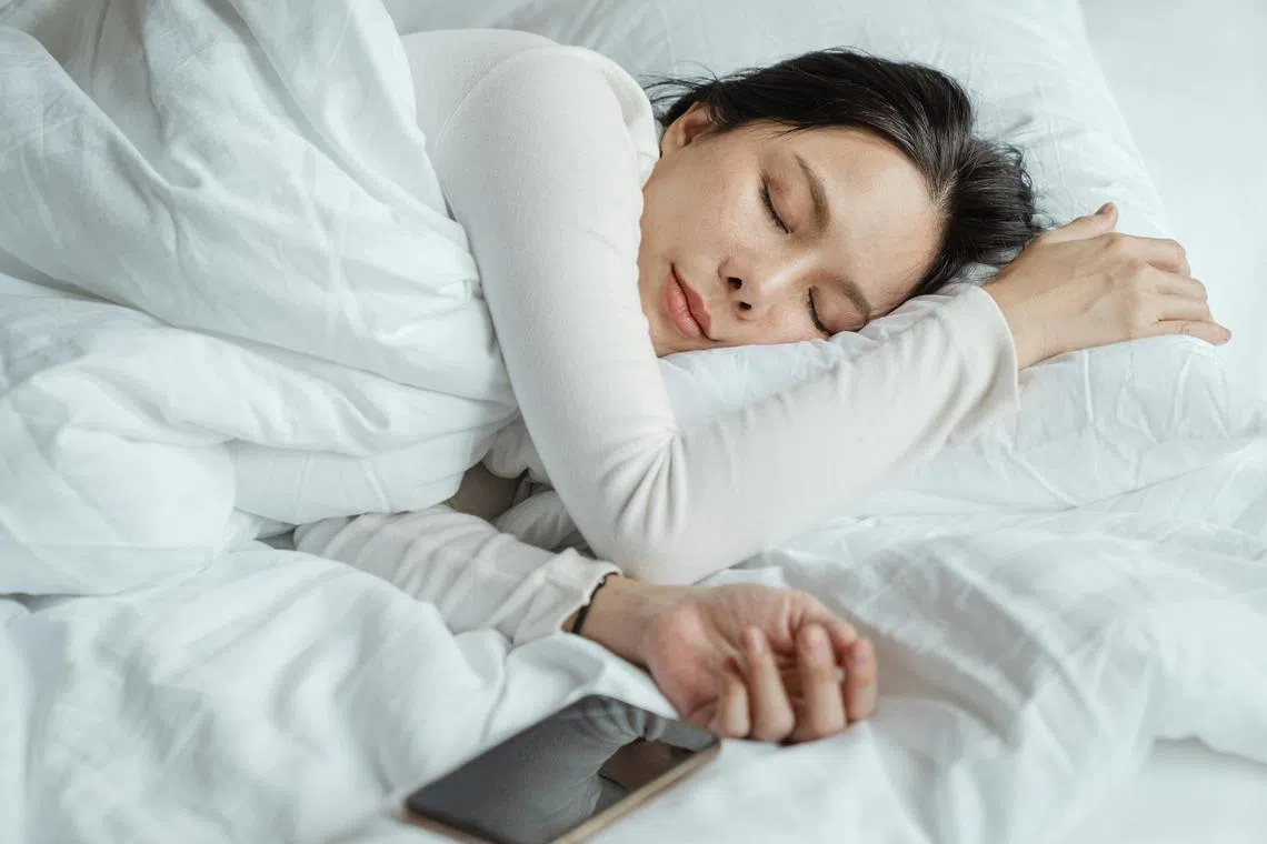 Although many people use their smartphones in bed, experts say it is best to limit one's exposure to electronics for at least 30 minutes before bedtime.  