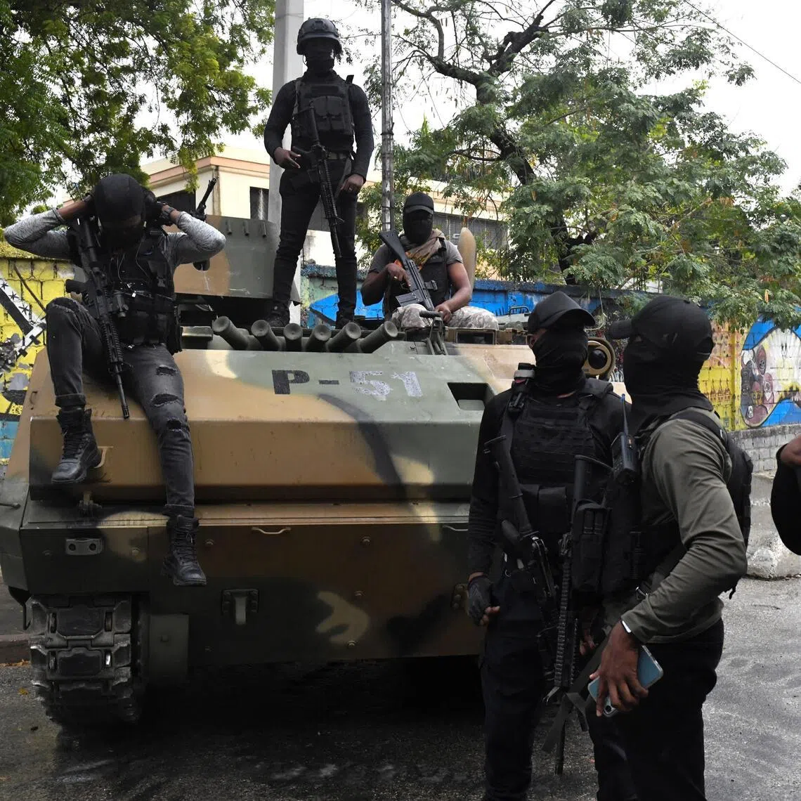Haitian security forces guard the area near the National Palace on Feb 7.