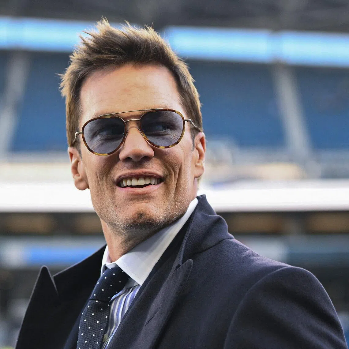 Former NFL player Tom Brady does not want to pick sides in the Super Bowl clash between New England and Seattle.