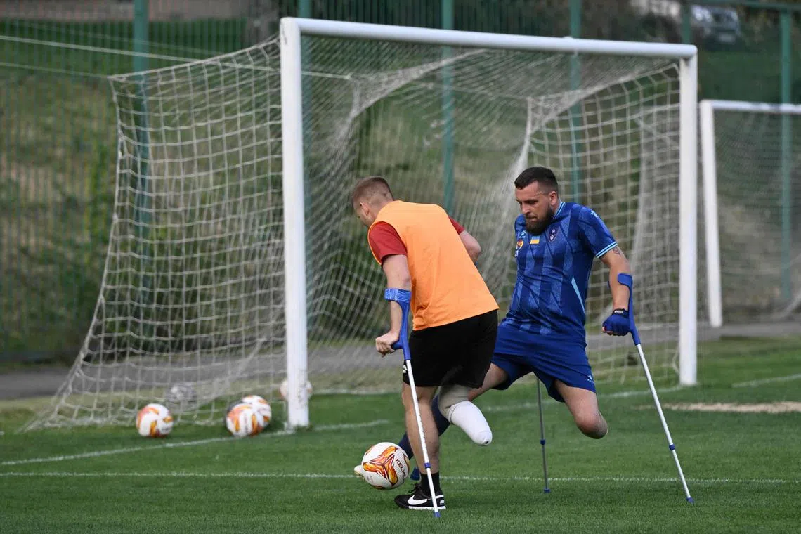 Amputee football players attend a training session in Kyiv on May 23, 2024, amid the Russian invasion of Ukraine.