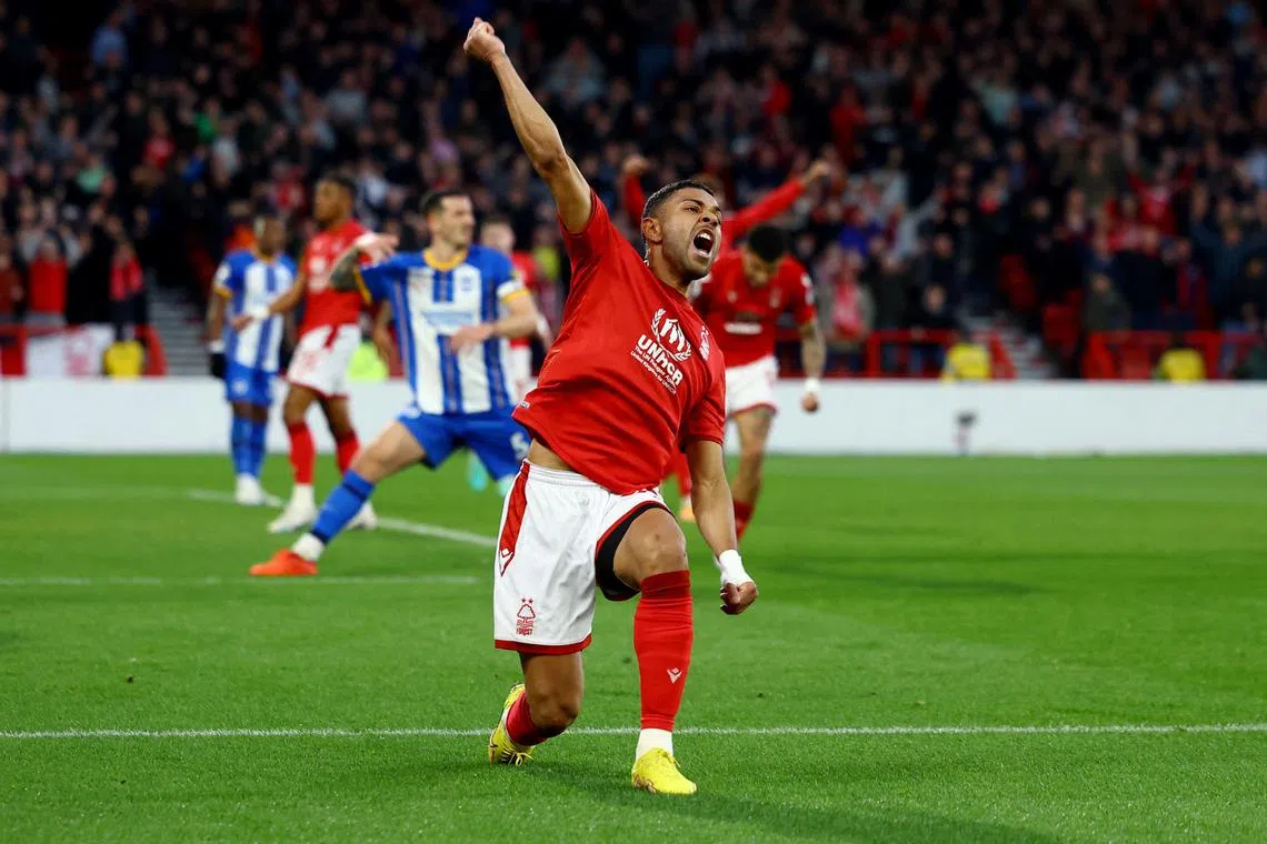 Nottingham Forest's Renan Lodi celebrates after Brighton's Pascal Gross scores an own goal and the first goal for Forest.