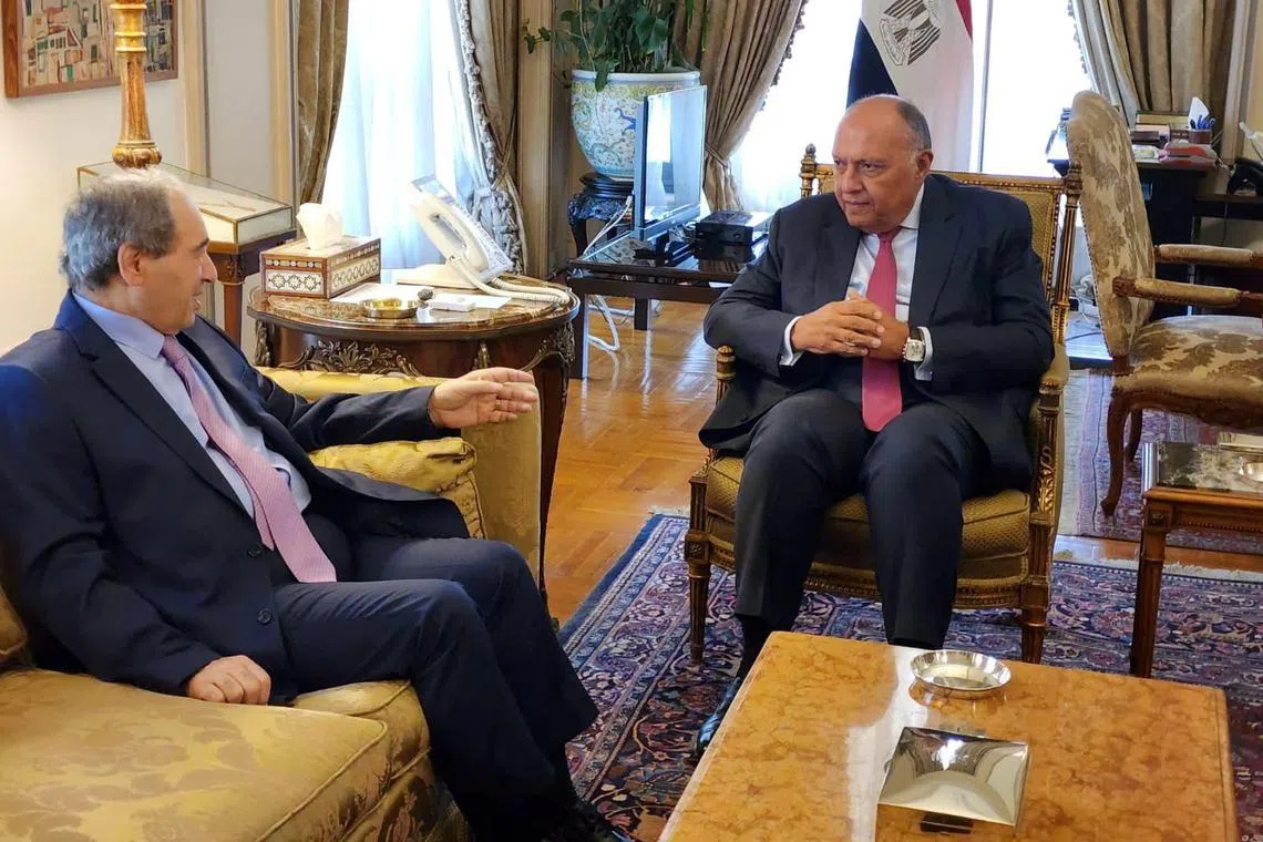 Egyptian Foreign Minister Sameh Shoukry (right) met with Syrian Foreign Minister Faisal Mekdad in Cairo, Egypt on April 1.  The visit to Egypt is a first in more than 10 years for a Syrian top diplomat. 