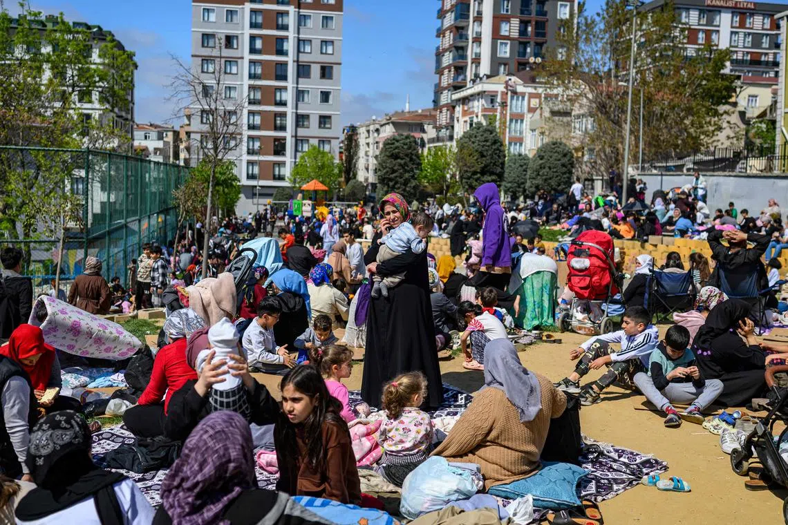 Residents waiting in a park in Istanbul on April 23, following a magnitude 6.2 earthquake that was followed by aftershocks.