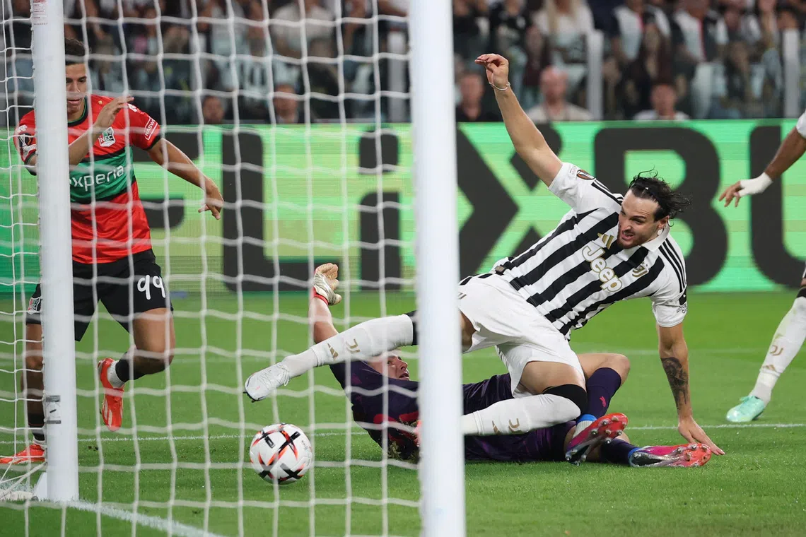Soccer Football - UEFA Europa League - Juventus v NEC - Allianz Stadium, Turin, Italy - September 17, 2026 Juventus' Federico Gatti in action with NEC's Nikolas Polster REUTERS/Claudia Greco