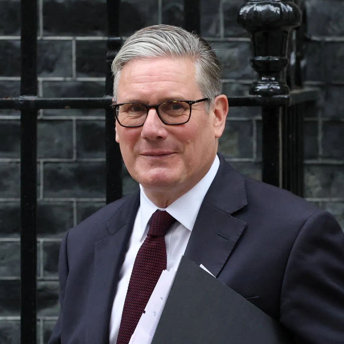 British Prime Minister Keir Starmer walks outside 10 Downing Street in London, Britain, July 1, 2026. REUTERS/Isabel Infantes